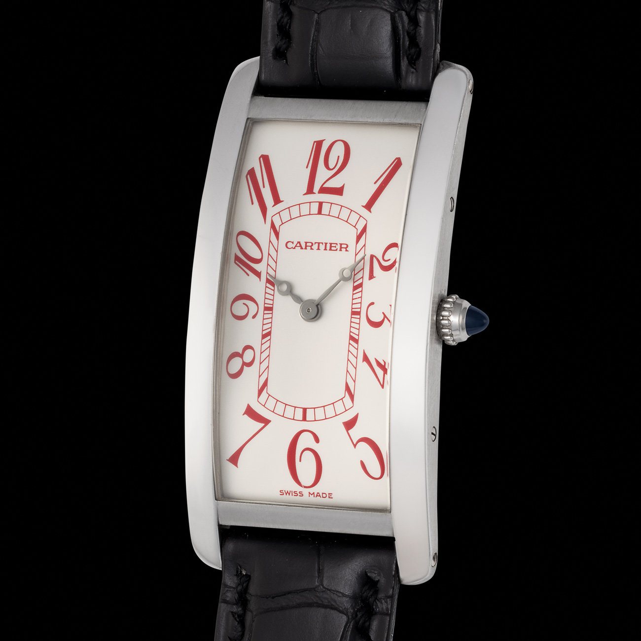 Lot 79 - A number 1/50 Tank Cintrée in platinum with red Arabic numerals, a unique special-order version of an iconic form.