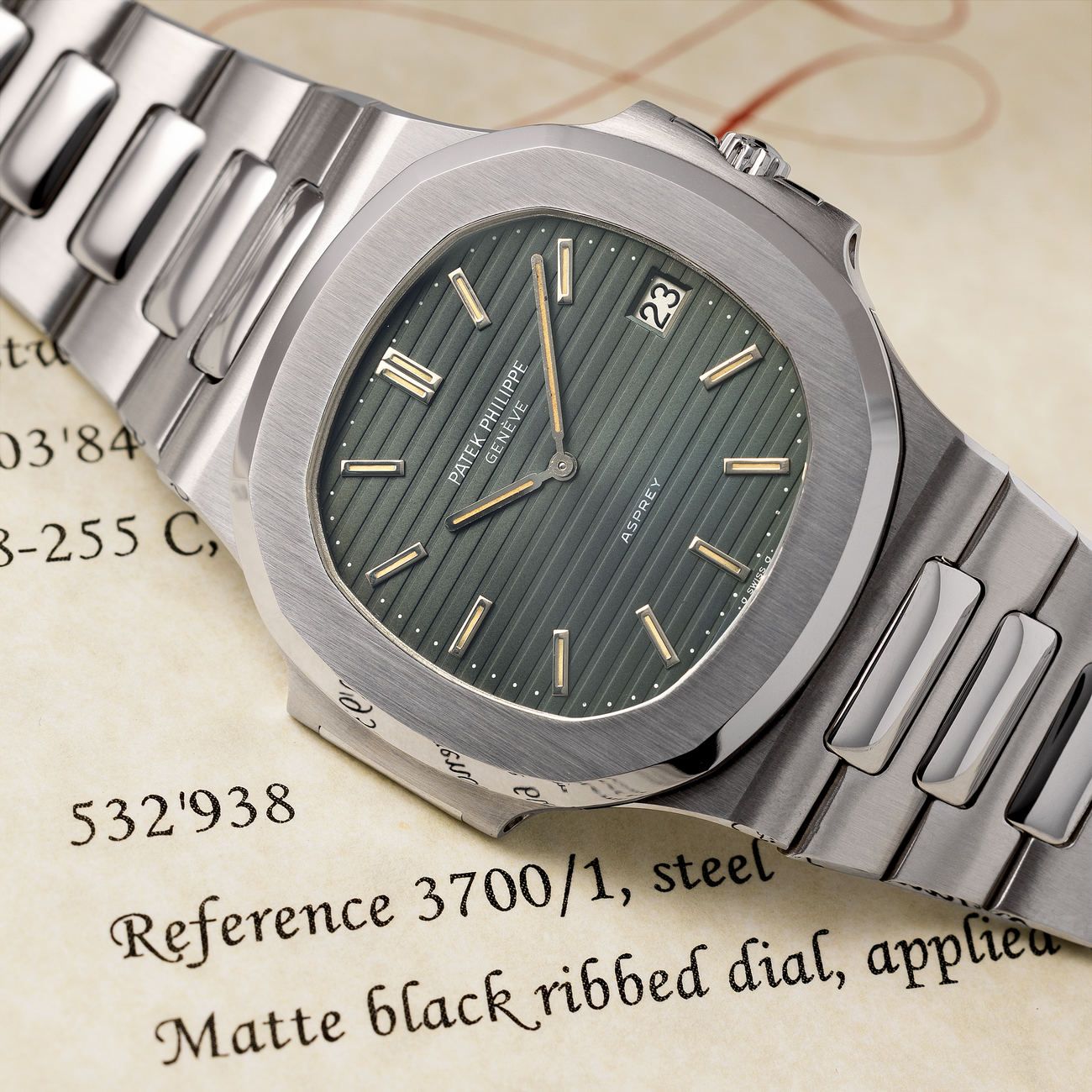 Lot 223 – Incredibly rare Patek Philippe Nautilus “Jumbo” 3700 with tropical greenish dial and Asprey signature at 6 o’clock. One of two known examples and accompanied by a Patek Philippe archive extract.