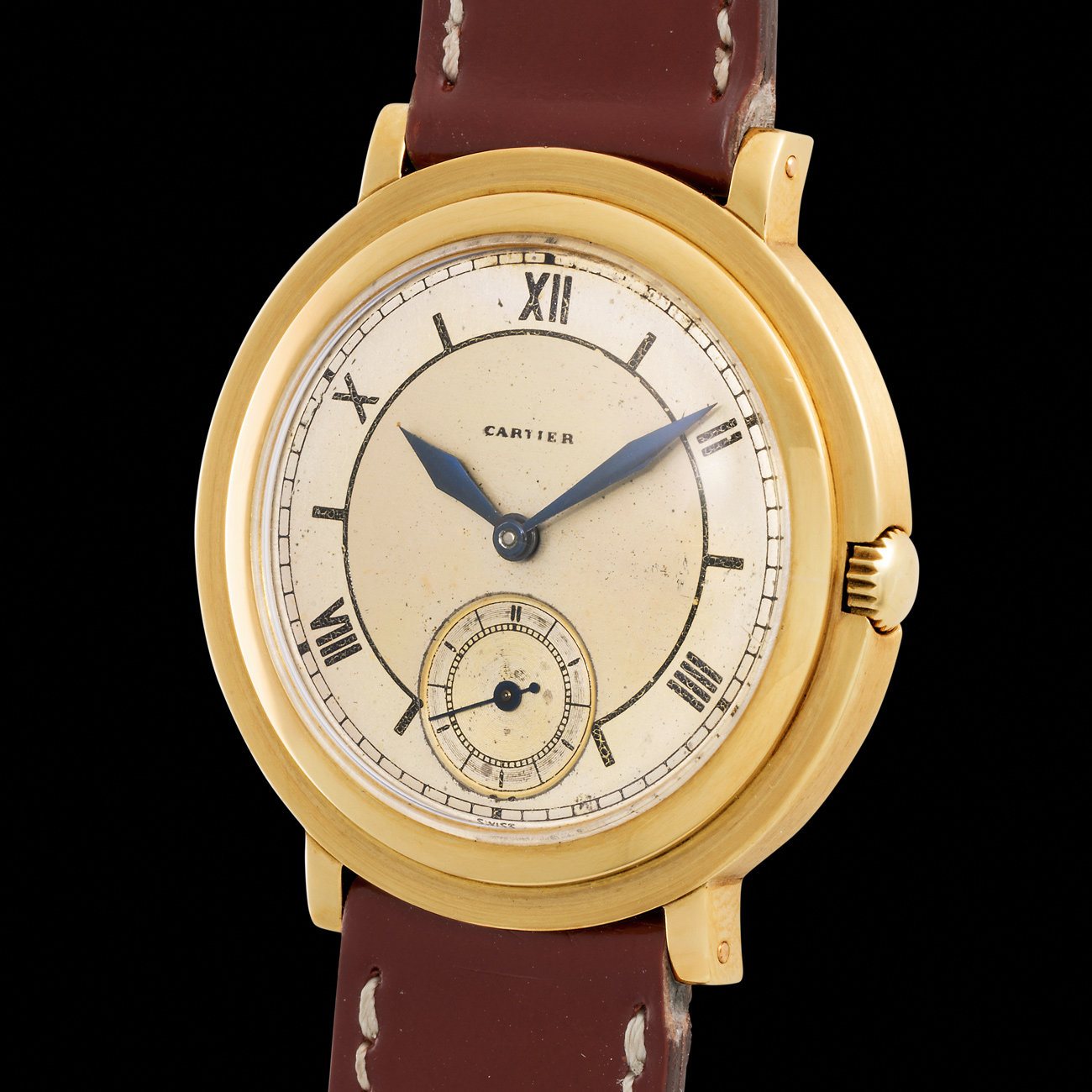 Lot 97 - A yellow gold Ronde Escalier with stepped case and two-tone sector dial, blending architectural boldness with classic Cartier elegance.