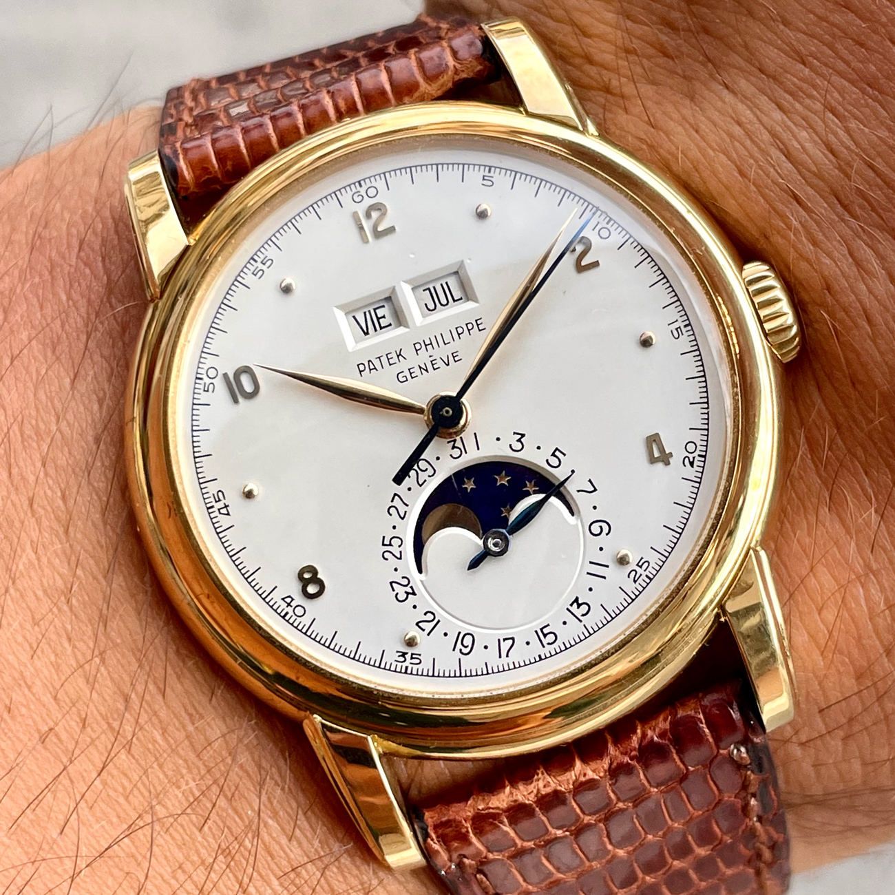 Patek Philippe reference 2497 calendar moonphase wristwatch in 18k yellow gold.