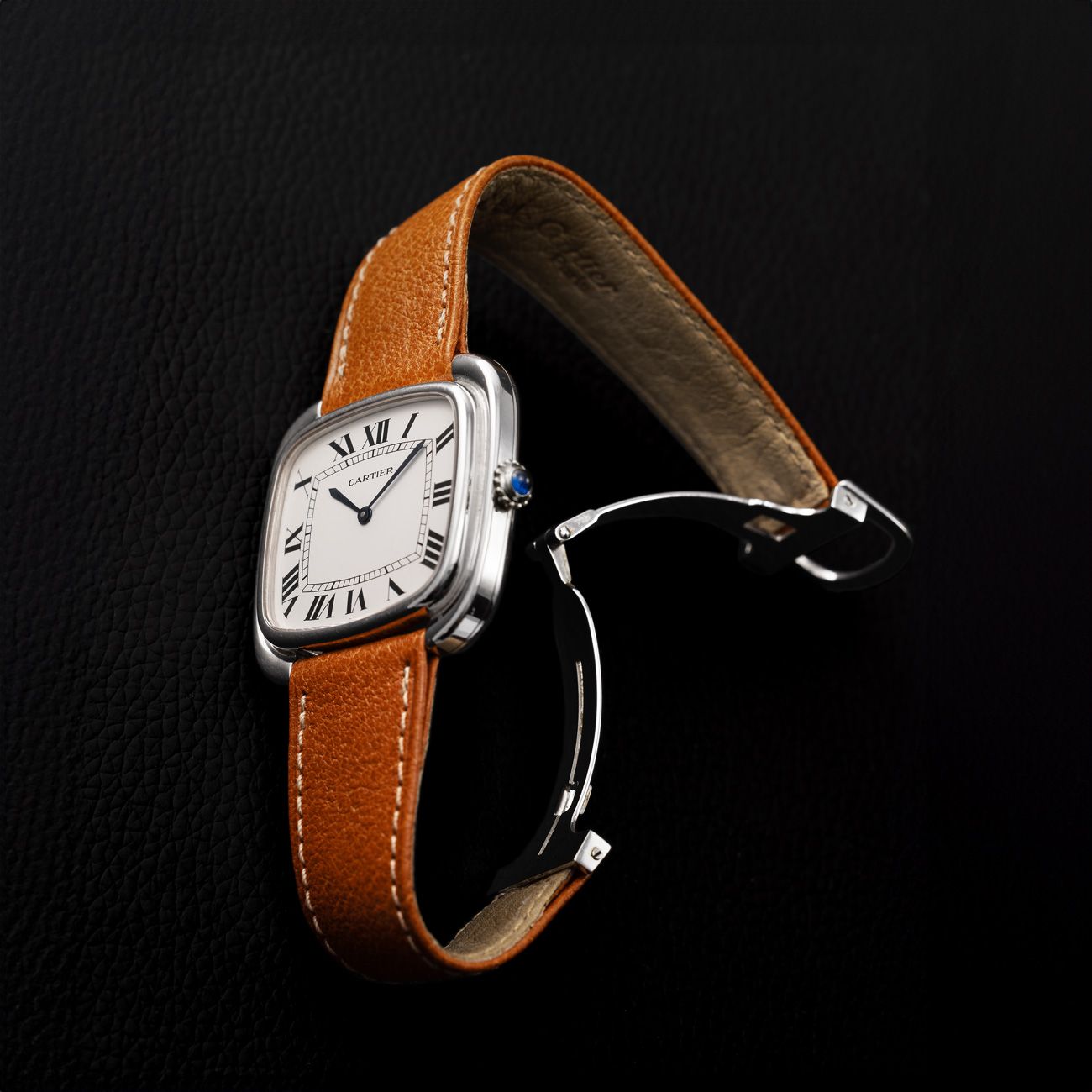 Cartier Gondole Jumbo, White GoldA bold white-gold "Jumbo" model with a TV screen design and Roman numeral dial, embodying 1970s vintage elegance.
