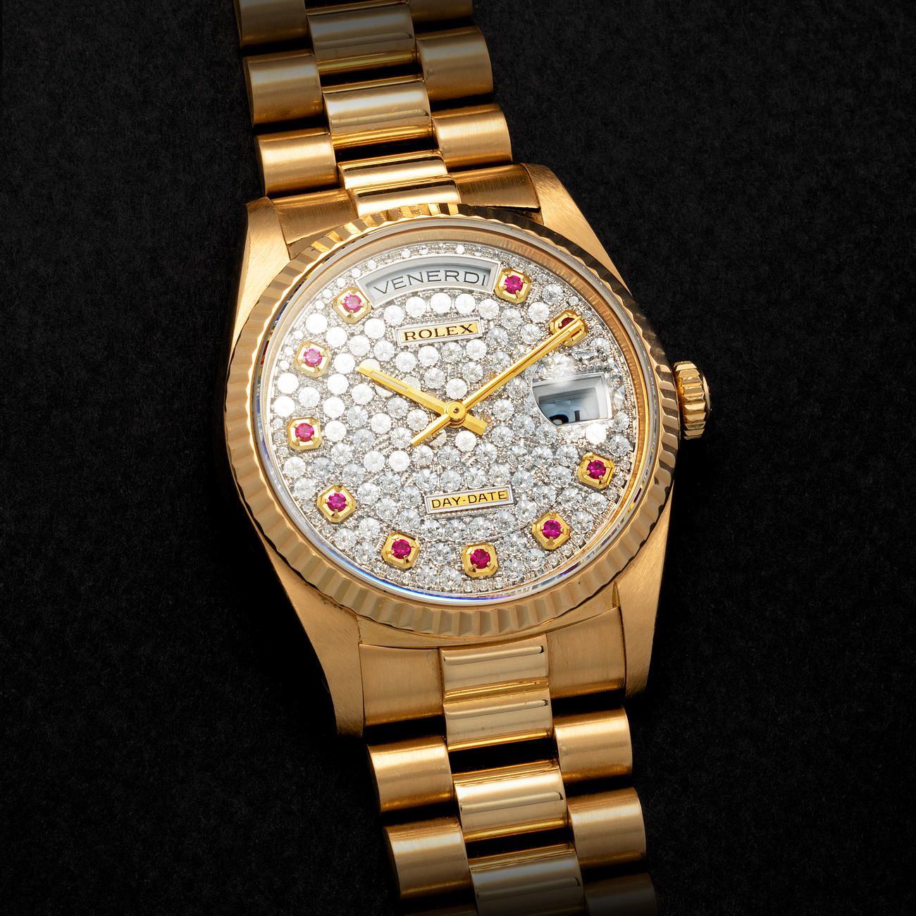 Lot 79 - Charismatic and Colorful, Daydate, Automatic Wristwatch in Gold, Extremely Rare Pavè Diamond Set Dial and Ruby Indexes, Reference 18238 – Estimate: € 30,000 – 60,000 – View lot detail