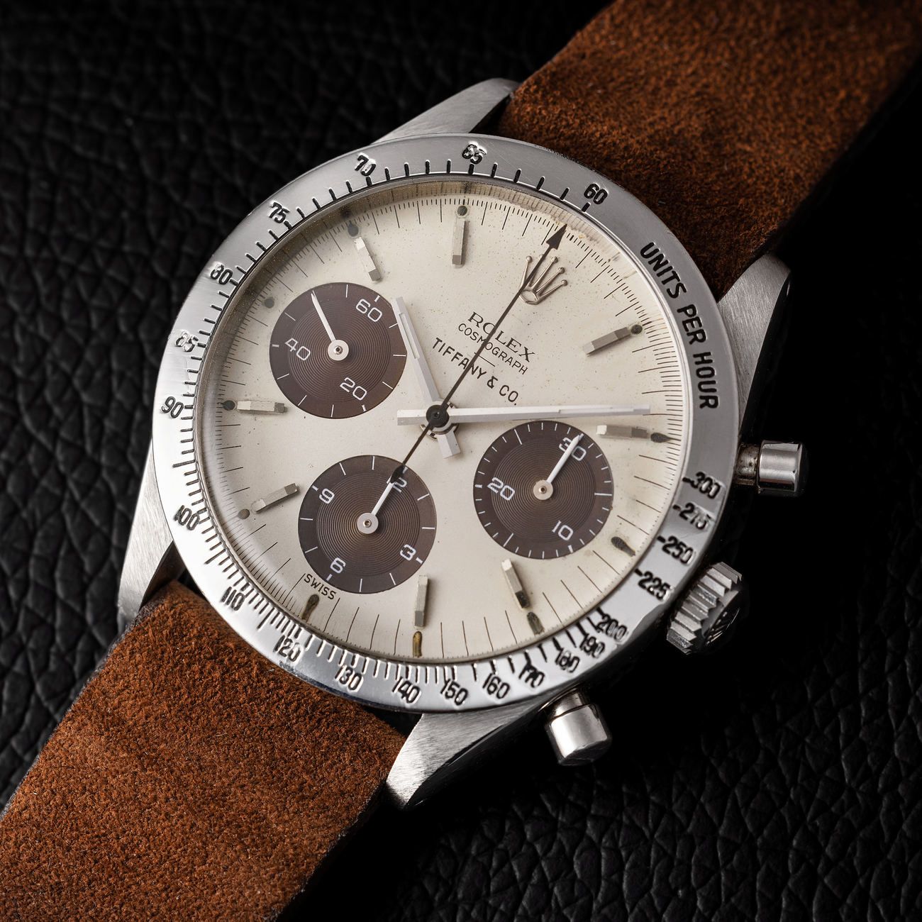 Lot 146 — Daytona Cosmograph Reference 6239 in Steel. “Double Swiss” underline dial with brown tropical registers. Retailed by Tiffany & Co, with Pucci Papaleo letter – View Lot