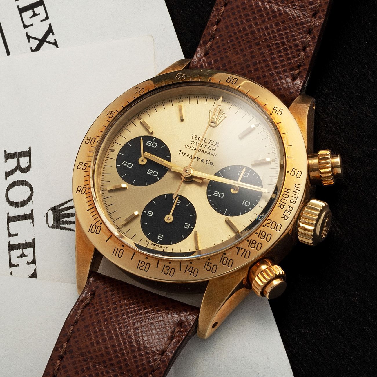 Lot 271 - Incredibly Rare, Outstanding and Possibly Unique, Daytona Cosmograph, Wristwatch in 14K Yellow Gold, With White Graphic, Three Linen, Retailed by Tiffany & Co, Reference 6265, With Rolex Watch Service Receipts – Estimate: € 450,000 – 900,000 – View lot detail