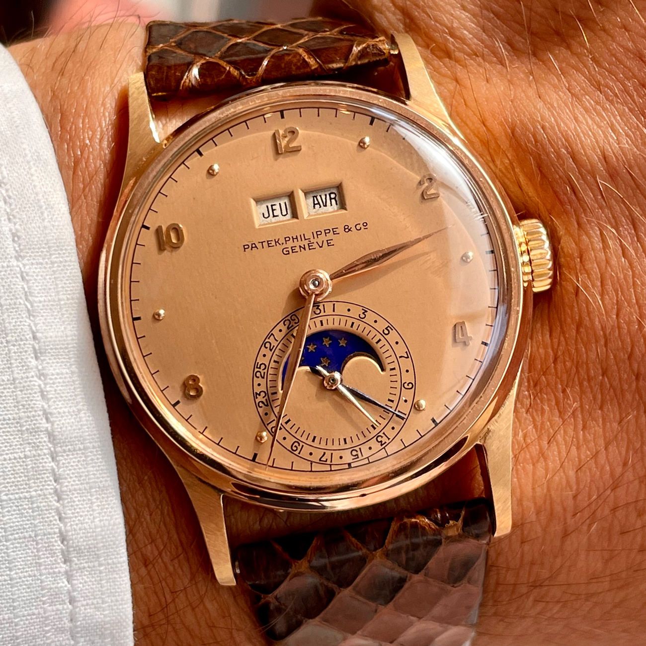 Patek Philippe reference 1526 moonphase calendar wristwatch in 18k pink gold with pink dial.