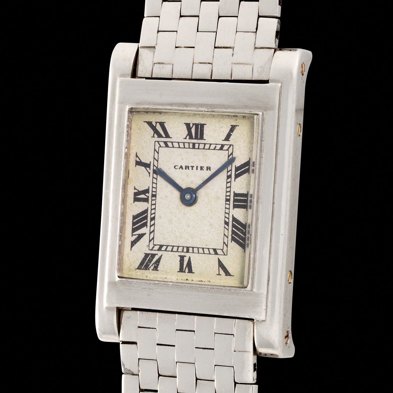 Lot 31 - A possibly unique Rectangulaire à Pattes in palladium with a rare bracelet and pink gold clasp, published in White Cartier Bianco