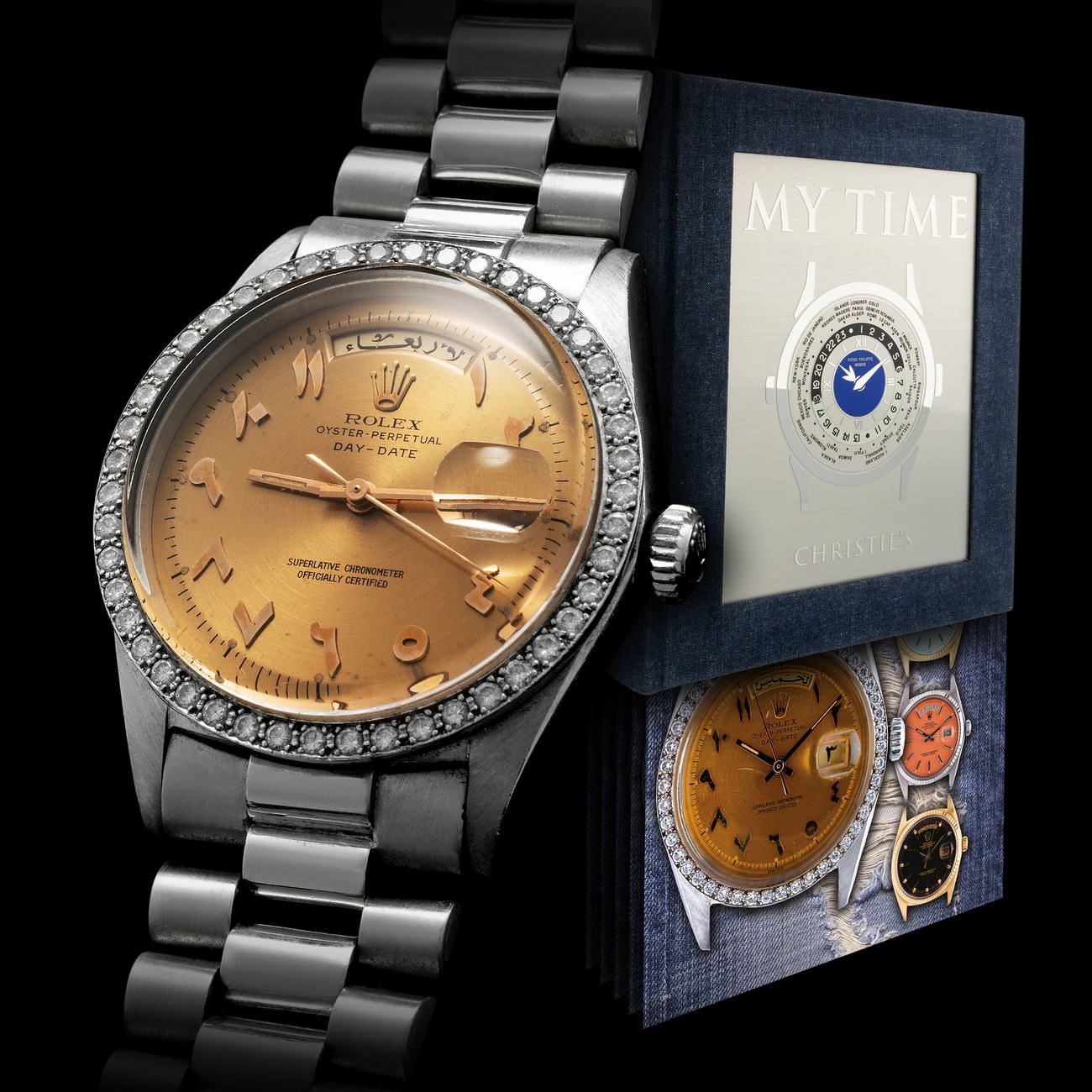 Lot 270 - Extremely Rare and Very Important, Day-Date “Scheherazade”, Automatic Wristwatch in Platinum and Diamonds, With Arabic Calendar and Applied Bronze Arabic Numerals Dial, Published in the Iconic Book “My Time” – Estimate: € 150,000 – 300,000 – View lot detail