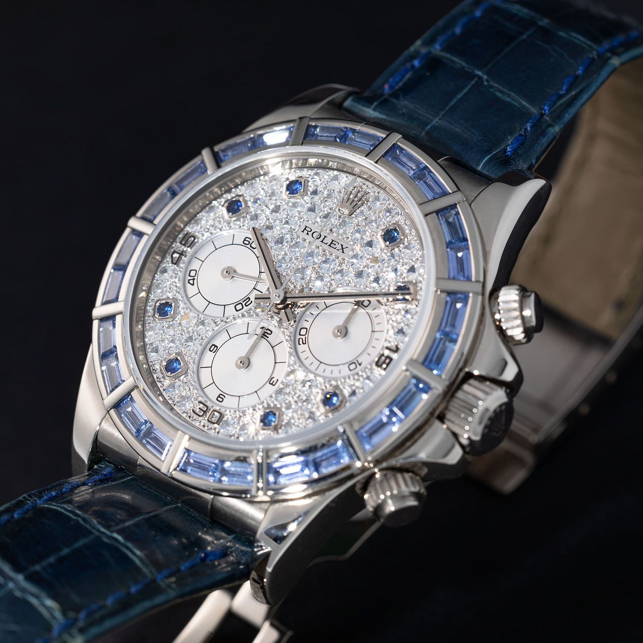 Lot 76 — ROLEX, Highly Exclusive, Impressive and Attractive, Daytona, Automatic Chronograph in White Gold, Sapphire-Set Bezel, Full Diamond-Pavè and Sapphire Indexes Dial, Reference 16589SACI – Estimate: € 140,000 – 280,000 – VIEW LOT