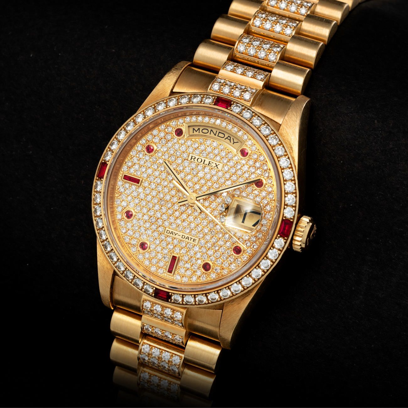 Lot 243 - Precious, Very Rare and Colorful, Day-Date, Automatic Wristwatch in Yellow Gold, With Full Diamond and Rubies Set Dial and Bezel, With Diamond Bracelet and Rolex Sticker, Reference 18 378 – Estimate: € 40,000 – 80,000 – View lot detail