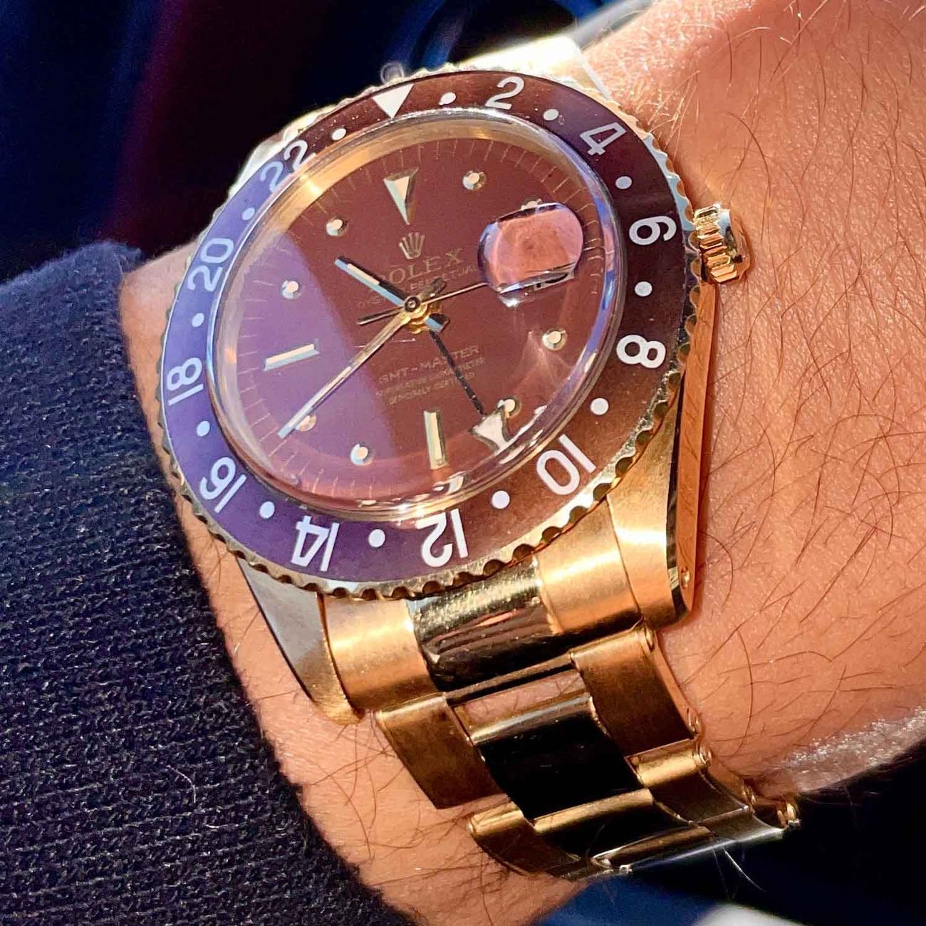Very early Rolex GMT-Master reference 1675 in 18k yellow gold with brown bezel and dial.